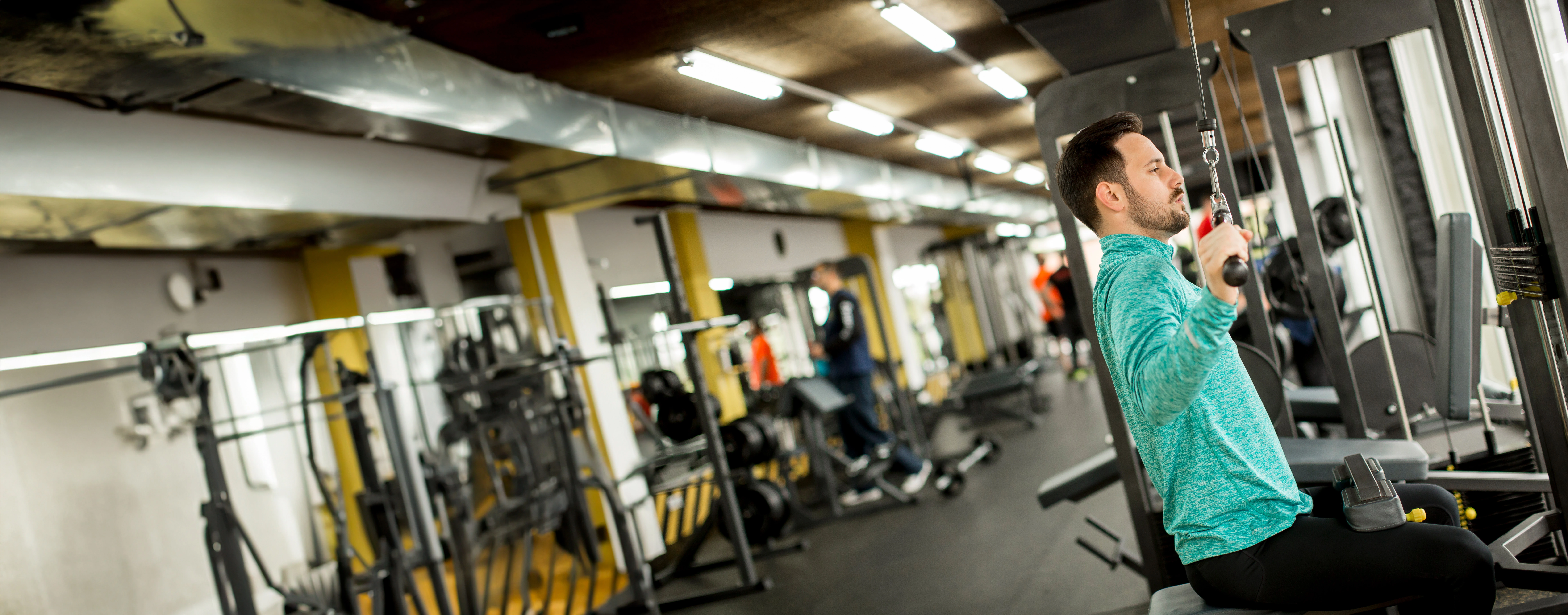 man-doing-excersise-on-a-lat-machine-in-gym-2023-11-27-05-12-22-utc.webp man-doing-excersise-on-a-lat-machine-in-gym-2023-11-27-05-12-22-utc.webp